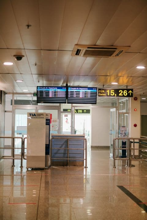 Airport departure gate with passengers waiting to board