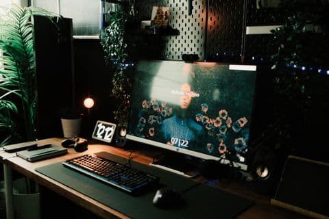 Home office desk setup with computer and router